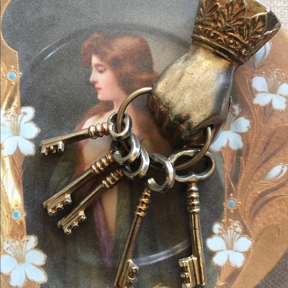 Hand Holding Skeleton Keys Vintage Dress Clip